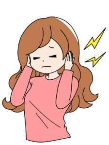 耳鳴りに悩む女性